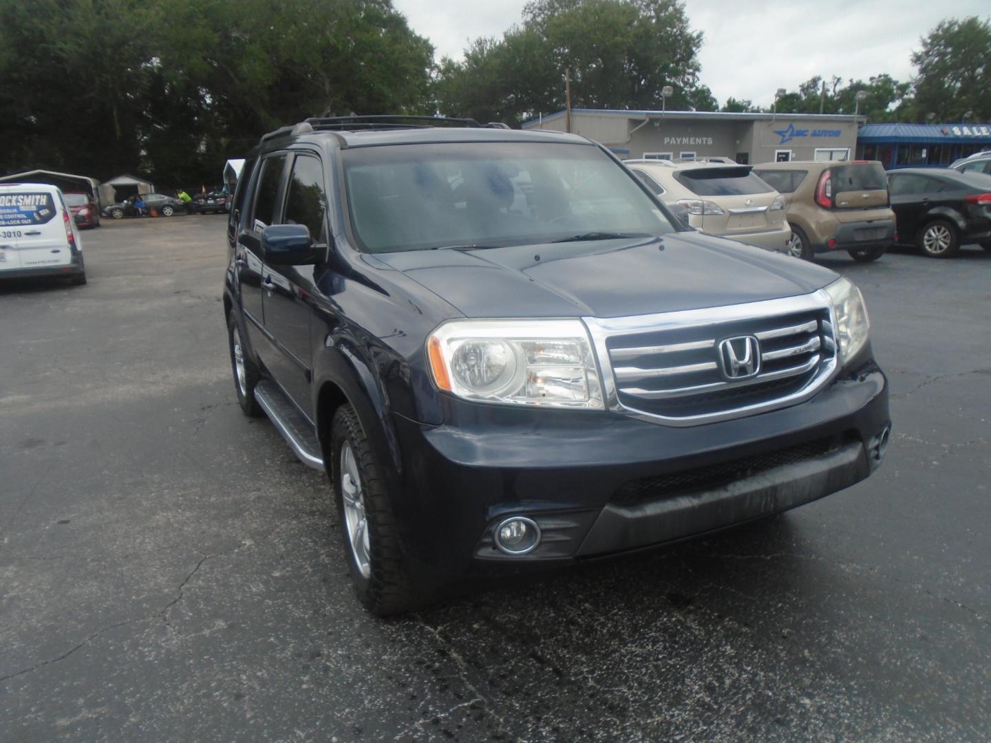 2012 Honda Pilot EX-L 2WD 5-Spd AT (5FNYF3H53CB) with an 3.5L V6 SOHC 24V engine, 5-Speed Automatic transmission, located at 6112 N Florida Avenue, Tampa, FL, 33604, (888) 521-5131, 27.954929, -82.459534 - Photo#2