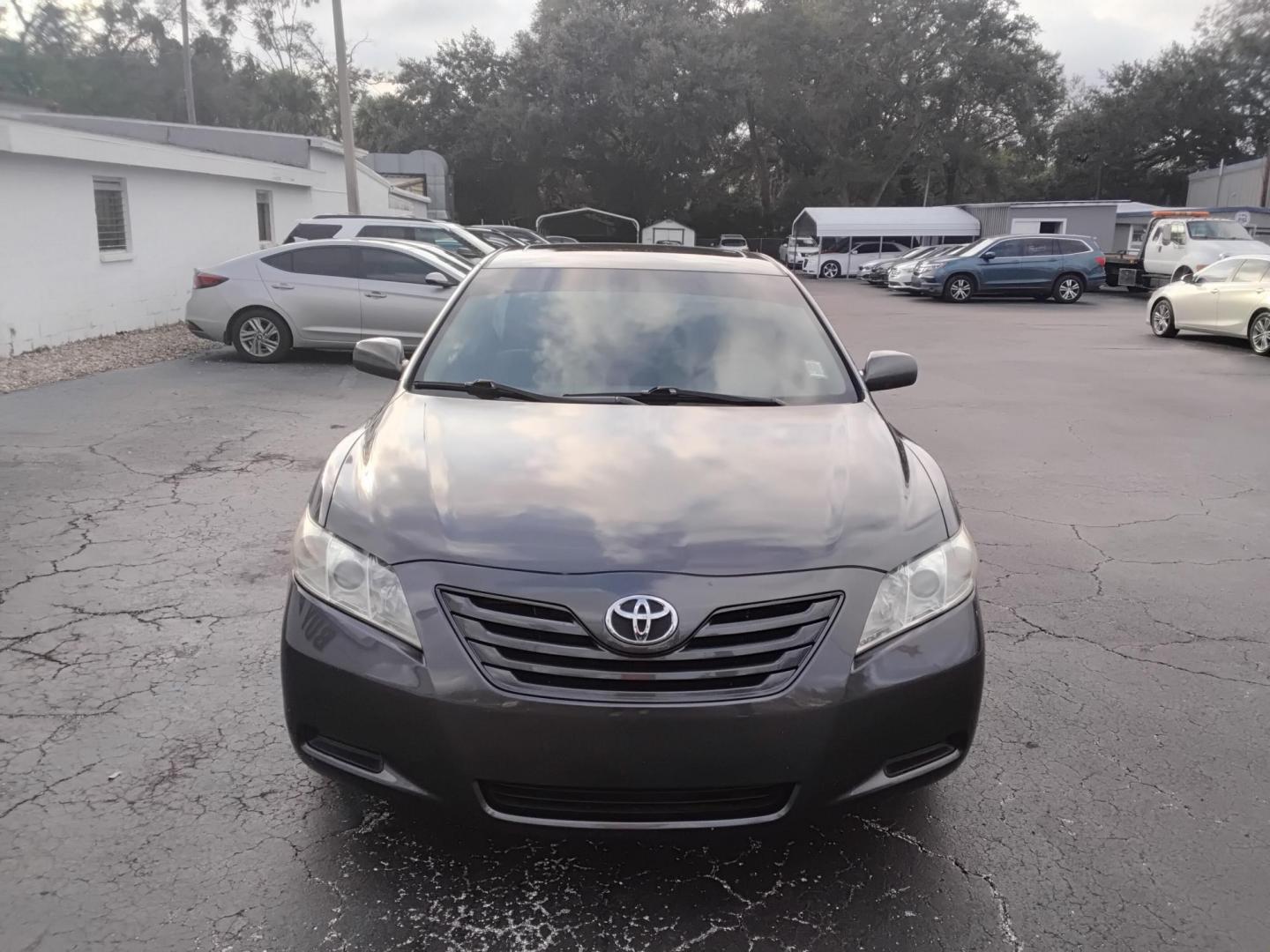 2009 GRAY /Grey Toyota Camry CE 5-Spd AT (4T1BE46K59U) with an 2.4L L4 DOHC 16V engine, 5-Speed Automatic Overdrive transmission, located at 6112 N Florida Avenue, Tampa, FL, 33604, (888) 521-5131, 27.954929, -82.459534 - 499$ down plus tax & tag. - Photo#1