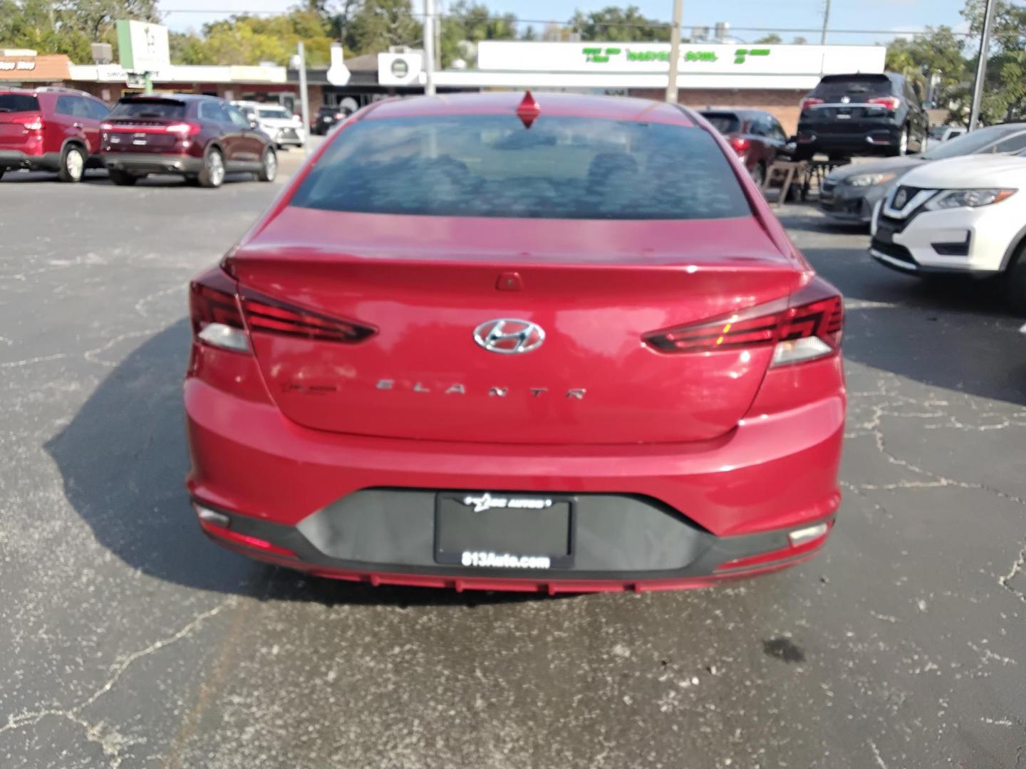 2019 RED /Beige Hyundai Elantra Limited (5NPD84LF2KH) with an 1.8L L4 DOHC 16V engine, 6A transmission, located at 6112 N Florida Avenue, Tampa, FL, 33604, (888) 521-5131, 27.954929, -82.459534 - 499$ down plus tax & tag. - Photo#6