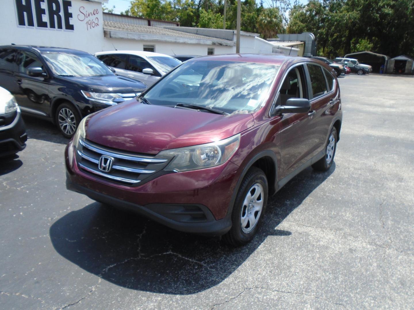 2014 Honda CR-V LX 4WD 5-Speed AT (5J6RM4H39EL) with an 2.4L L4 DOHC 16V engine, 5-Speed Automatic transmission, located at 6112 N Florida Avenue, Tampa, FL, 33604, (888) 521-5131, 27.954929, -82.459534 - Photo#2