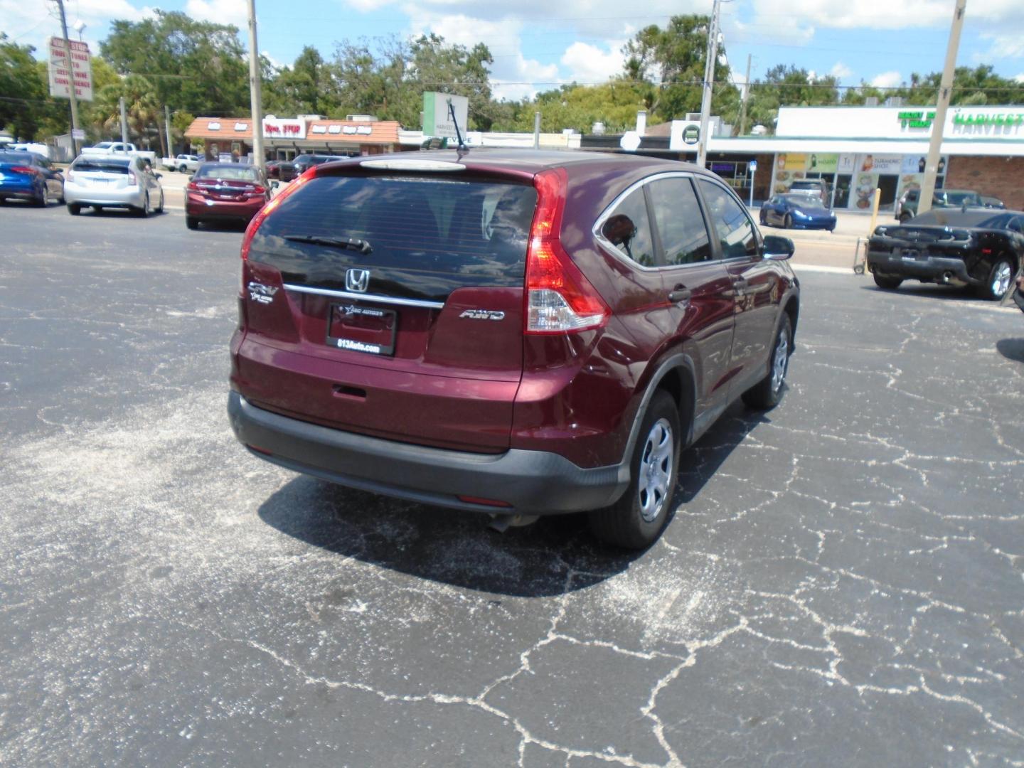 2014 Honda CR-V LX 4WD 5-Speed AT (5J6RM4H39EL) with an 2.4L L4 DOHC 16V engine, 5-Speed Automatic transmission, located at 6112 N Florida Avenue, Tampa, FL, 33604, (888) 521-5131, 27.954929, -82.459534 - Photo#4