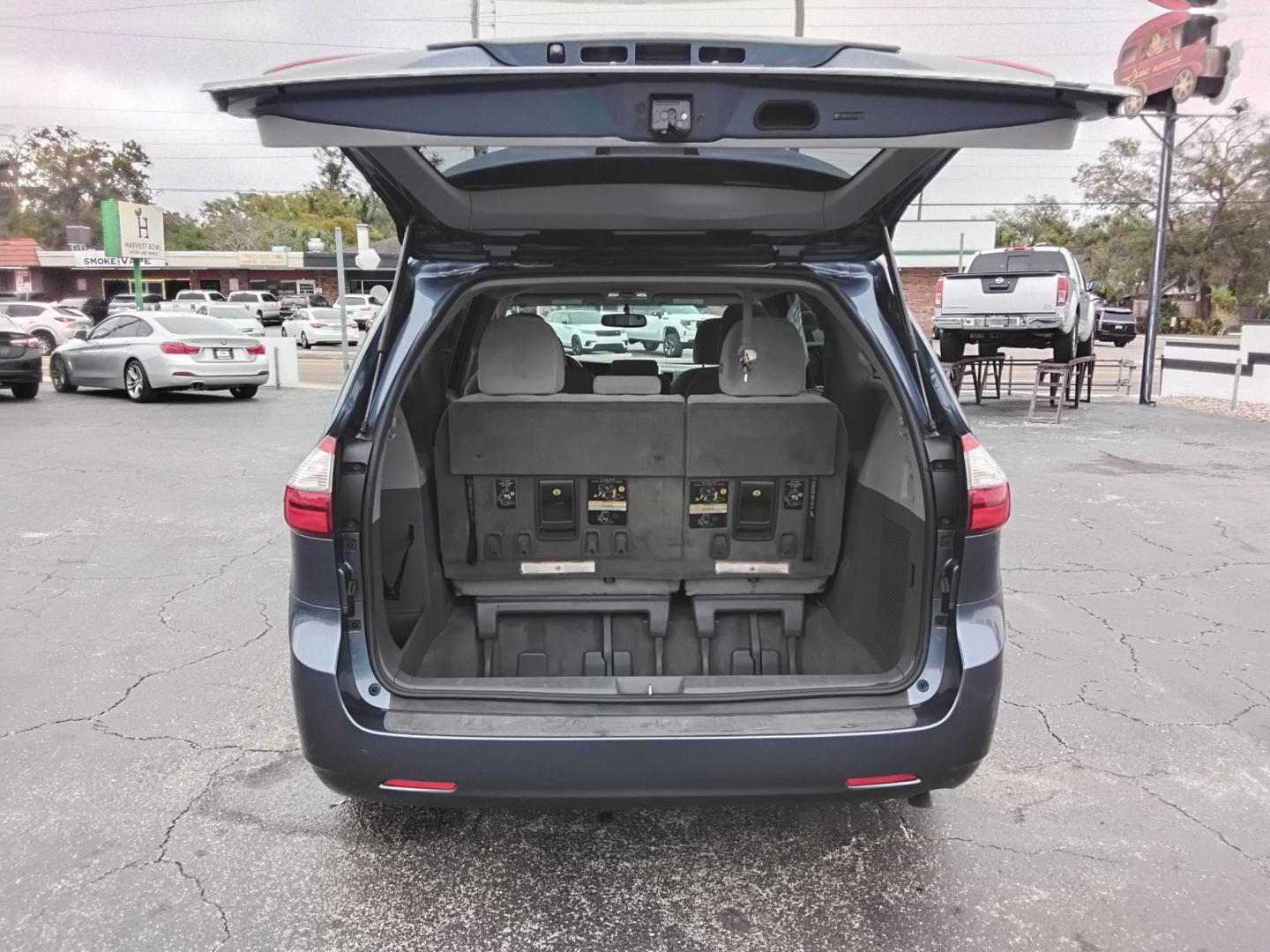 2015 BLUE /Beige Toyota Sienna (5TDKK3DC0FS) , located at 6112 N Florida Avenue, Tampa, FL, 33604, (888) 521-5131, 27.954929, -82.459534 - $499 down plus tax & tag. - Photo#13