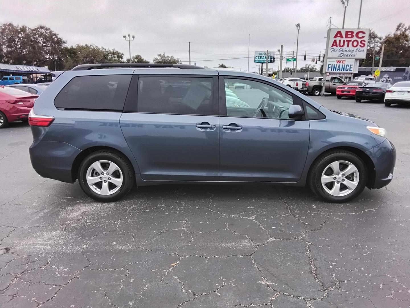 2015 BLUE /Beige Toyota Sienna (5TDKK3DC0FS) , located at 6112 N Florida Avenue, Tampa, FL, 33604, (888) 521-5131, 27.954929, -82.459534 - $499 down plus tax & tag. - Photo#5