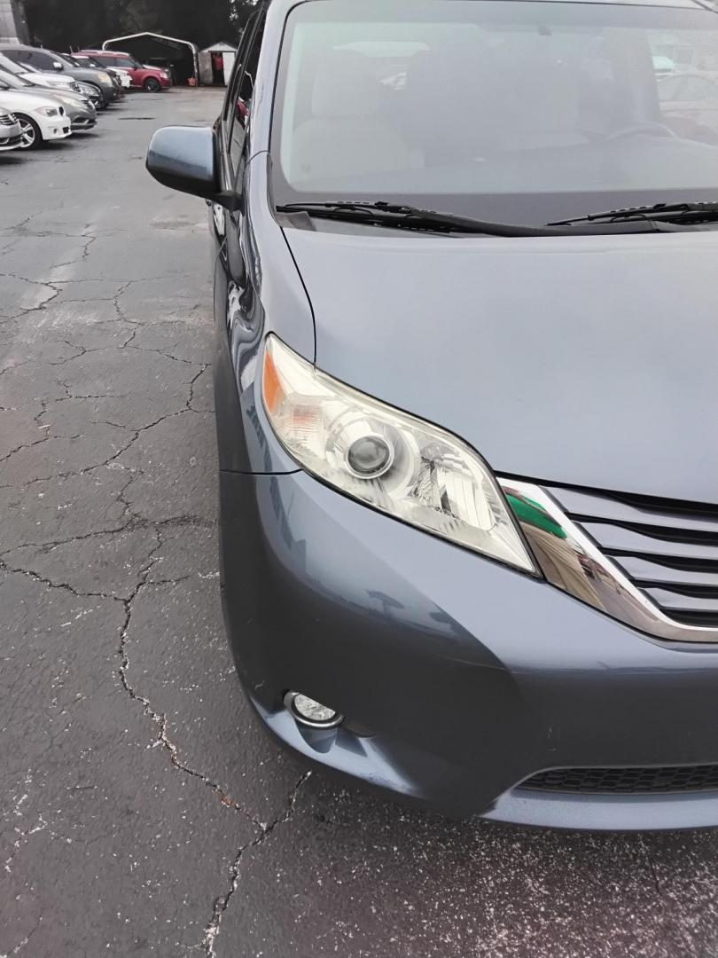 2015 BLUE /Beige Toyota Sienna (5TDKK3DC0FS) , located at 6112 N Florida Avenue, Tampa, FL, 33604, (888) 521-5131, 27.954929, -82.459534 - $499 down plus tax & tag. - Photo#6