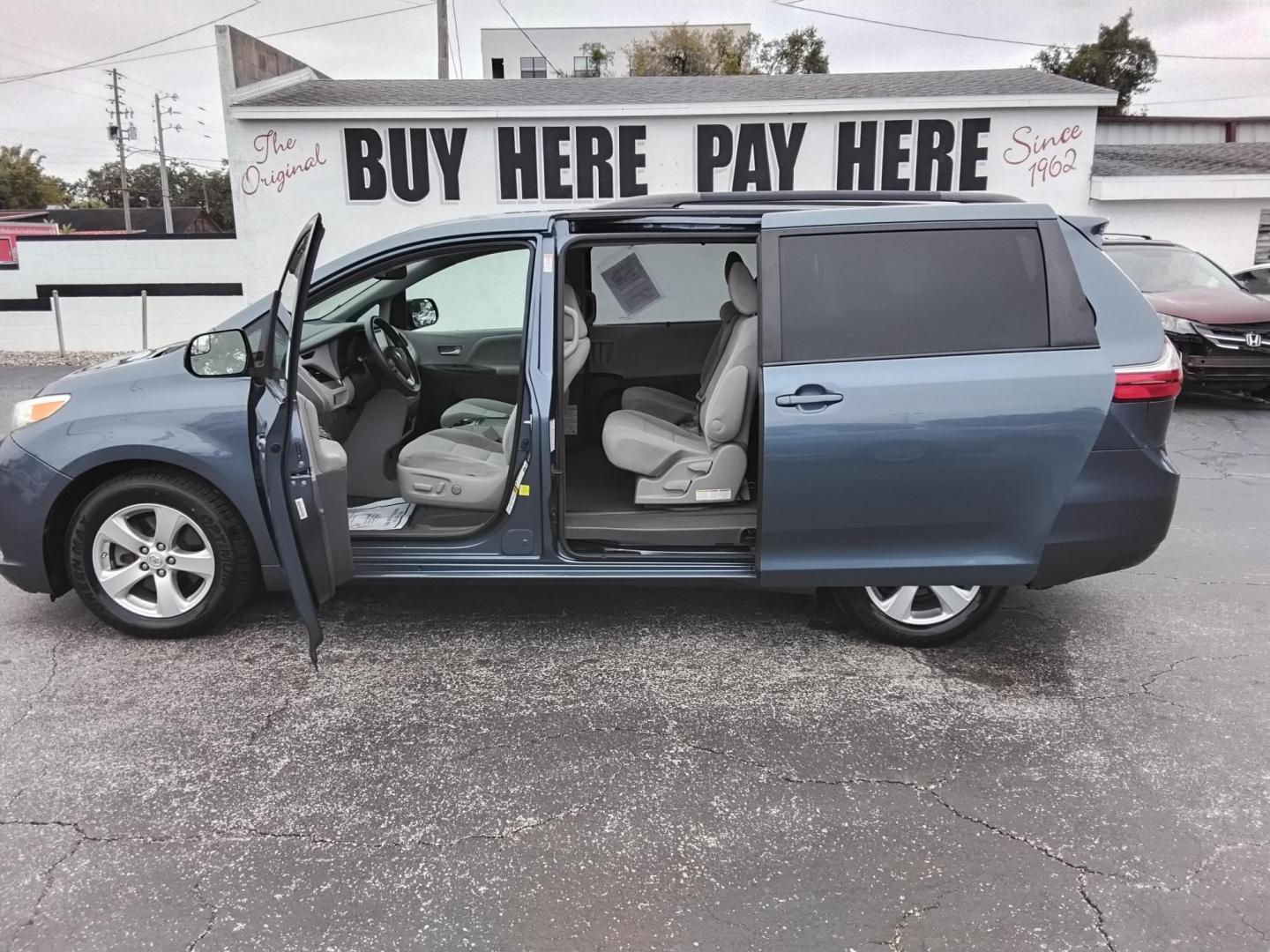 2015 BLUE /Beige Toyota Sienna (5TDKK3DC0FS) , located at 6112 N Florida Avenue, Tampa, FL, 33604, (888) 521-5131, 27.954929, -82.459534 - $499 down plus tax & tag. - Photo#0