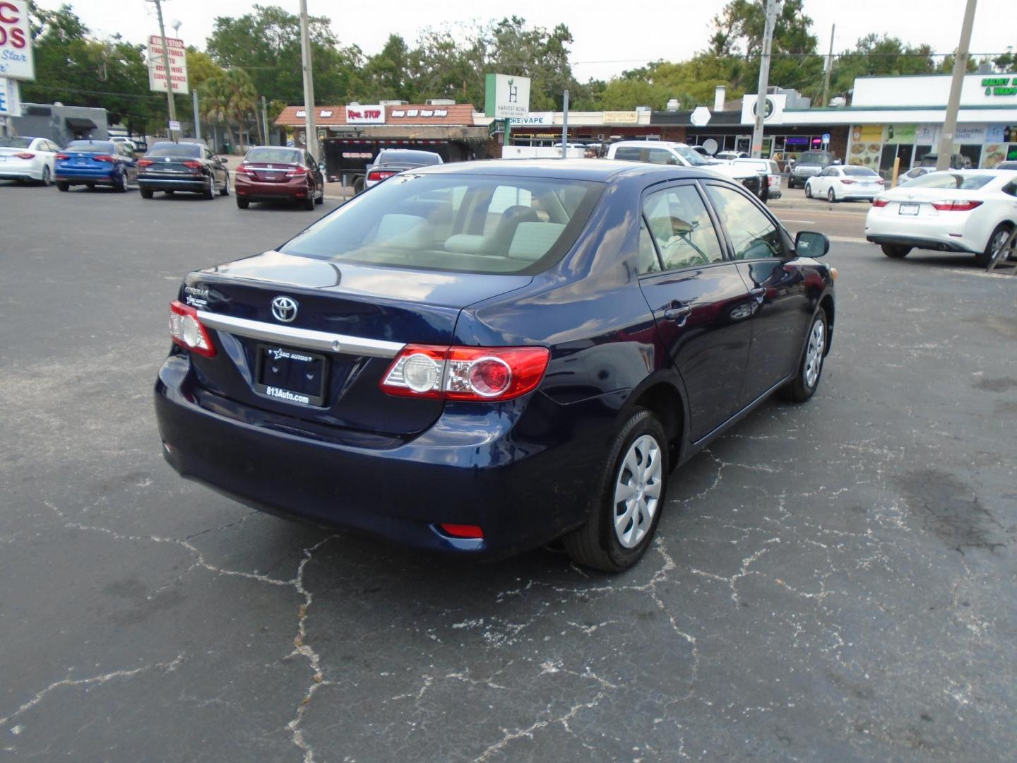 2012 Blue Toyota Corolla S 4-Speed AT (JTDBU4EE6C9) with an 1.8L L4 DOHC 16V engine, 4-Speed Automatic transmission, located at 6112 N Florida Avenue, Tampa, FL, 33604, (888) 521-5131, 27.954929, -82.459534 - Photo#5