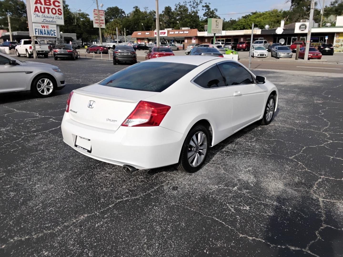 2012 White /Beige Honda Accord (1HGCS1B32CA) , located at 6112 N Florida Avenue, Tampa, FL, 33604, (888) 521-5131, 27.954929, -82.459534 - $499 DOWN PLUS TAX & TAG.- Photo#7