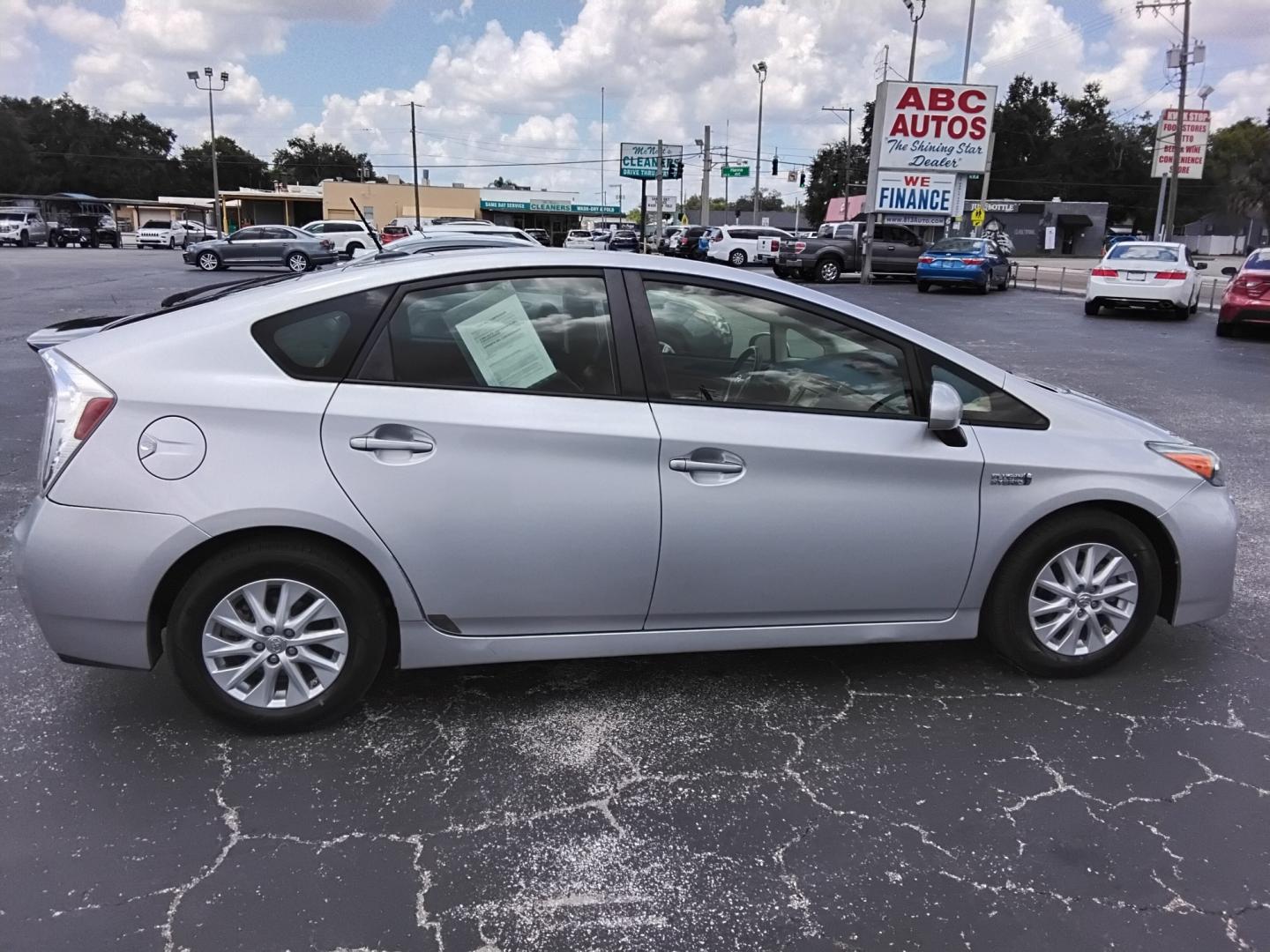 2012 SILVER /Black Toyota Prius (JTDKN3DP0C3) , located at 6112 N Florida Avenue, Tampa, FL, 33604, (888) 521-5131, 27.954929, -82.459534 - $499 DOWN PLUS TAX & TAG- Photo#4