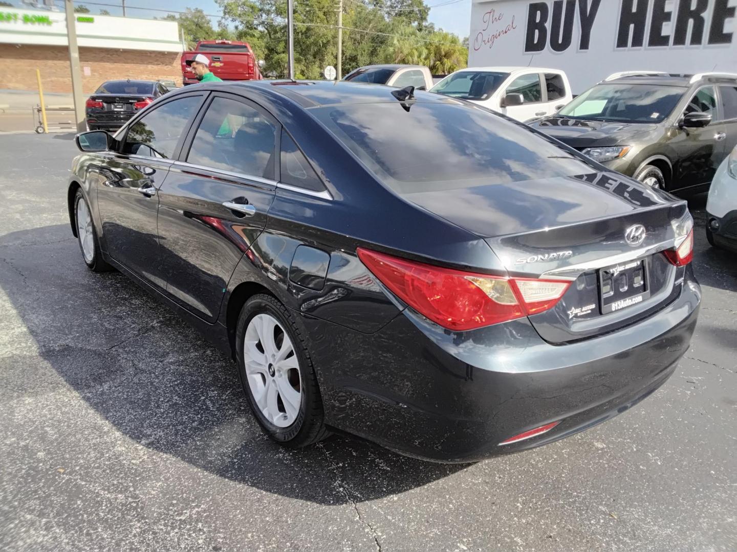 2013 Blue /Grey Hyundai Sonata (5NPEC4AC3DH) , located at 6112 N Florida Avenue, Tampa, FL, 33604, (888) 521-5131, 27.954929, -82.459534 - $499 DOWN PLUS TAX & TAG. - Photo#4