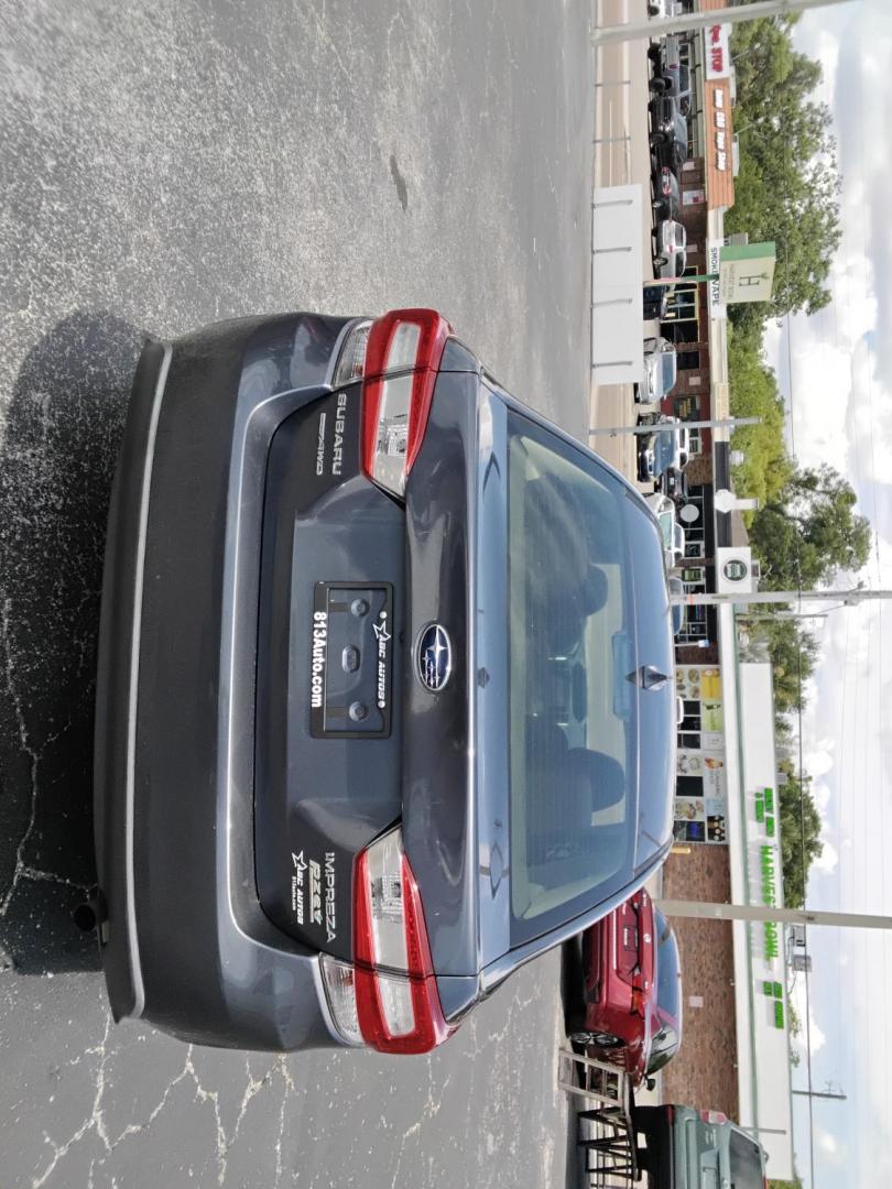 2017 GRAY /Grey Subaru Impreza 2.0i Premium CVT 4-Door (4S3GKAB65H3) with an 2.0L H4 DOHC 16V engine, CVT transmission, located at 6112 N Florida Avenue, Tampa, FL, 33604, (888) 521-5131, 27.954929, -82.459534 - $499 down plus tax & tag. - Photo#3