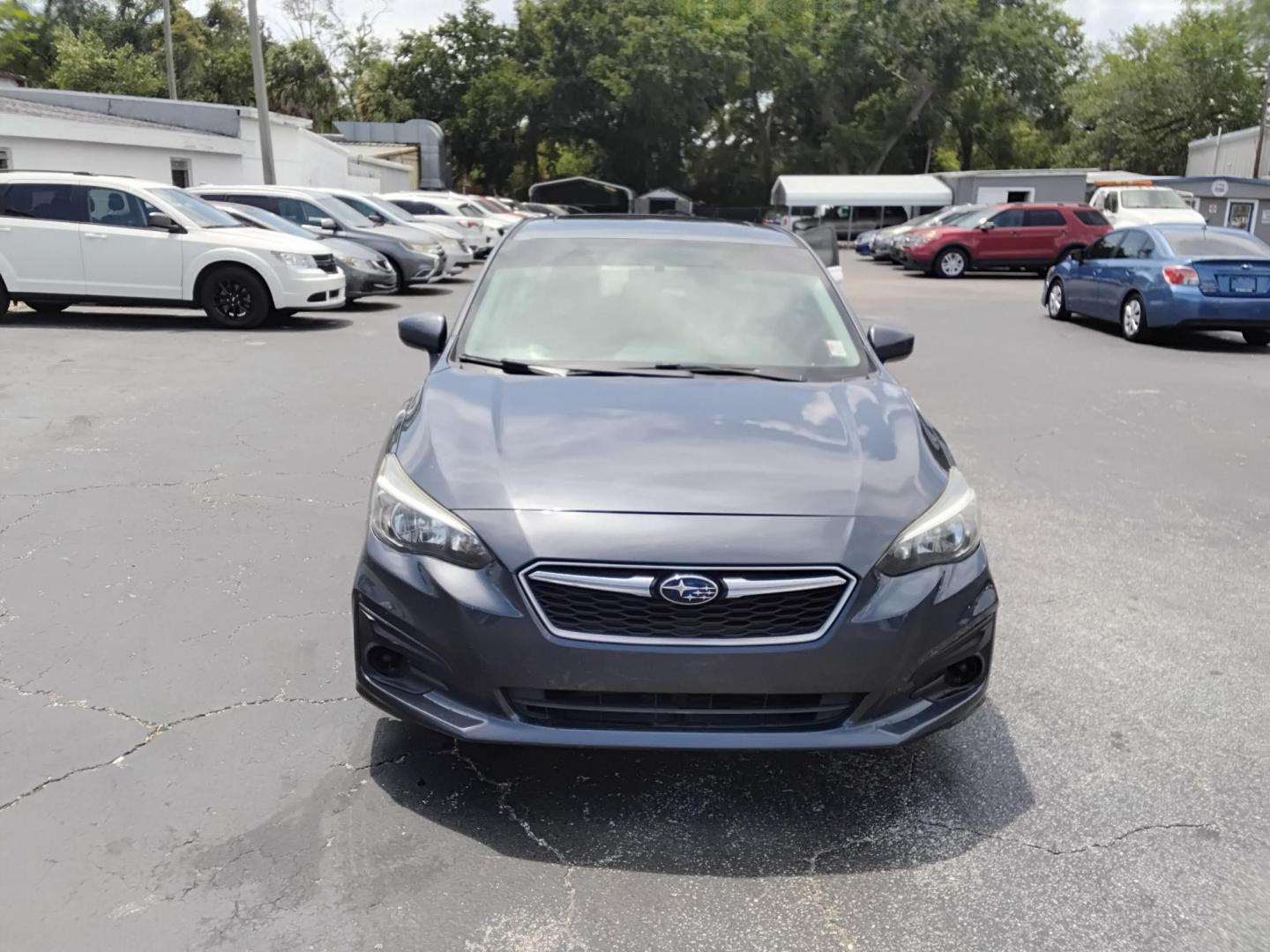 2017 GRAY /Grey Subaru Impreza 2.0i Premium CVT 4-Door (4S3GKAB65H3) with an 2.0L H4 DOHC 16V engine, CVT transmission, located at 6112 N Florida Avenue, Tampa, FL, 33604, (888) 521-5131, 27.954929, -82.459534 - $499 down plus tax & tag. - Photo#1