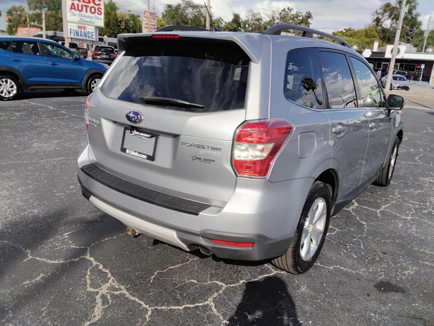 2014 SILVER /Beige Subaru Forester (JF2SJAPC8EH) , located at 6112 N Florida Avenue, Tampa, FL, 33604, (888) 521-5131, 27.954929, -82.459534 - 499$ DOWN PLUS TAX & TAG. - Photo#4