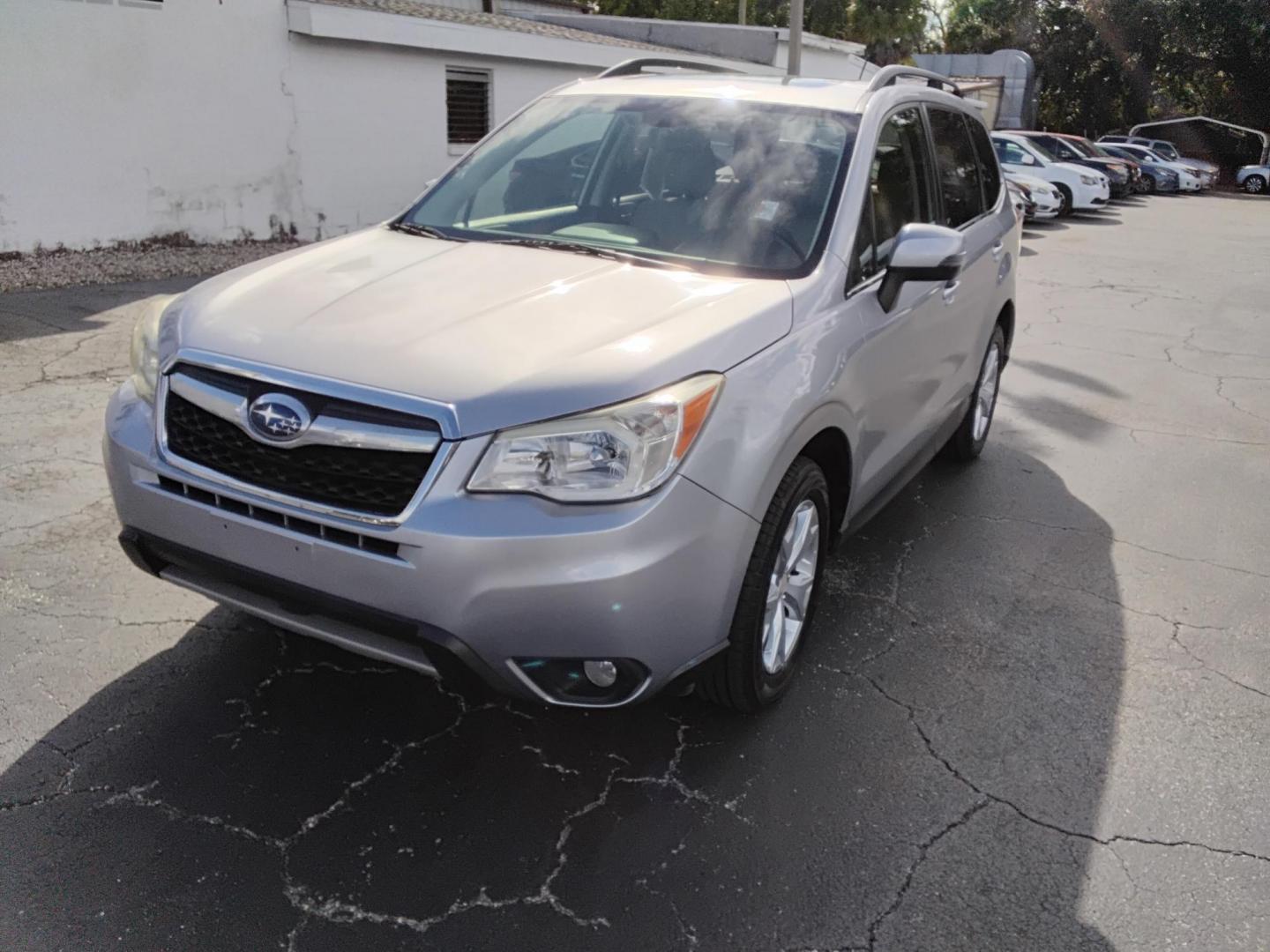2014 SILVER /Beige Subaru Forester (JF2SJAPC8EH) , located at 6112 N Florida Avenue, Tampa, FL, 33604, (888) 521-5131, 27.954929, -82.459534 - 499$ DOWN PLUS TAX & TAG. - Photo#2