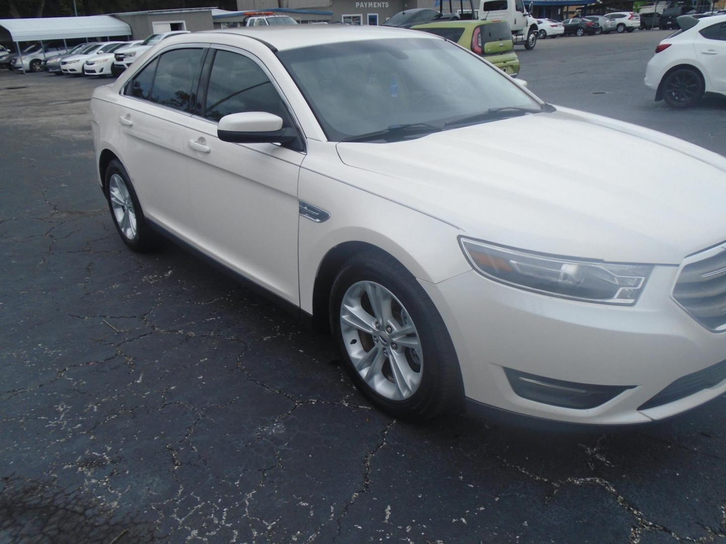 2017 White /Beige Ford Taurus (1FAHP2E8XHG) , located at 6112 N Florida Avenue, Tampa, FL, 33604, (888) 521-5131, 27.954929, -82.459534 - 499$ DOWN PLUS TAX & TAG. - Photo#3