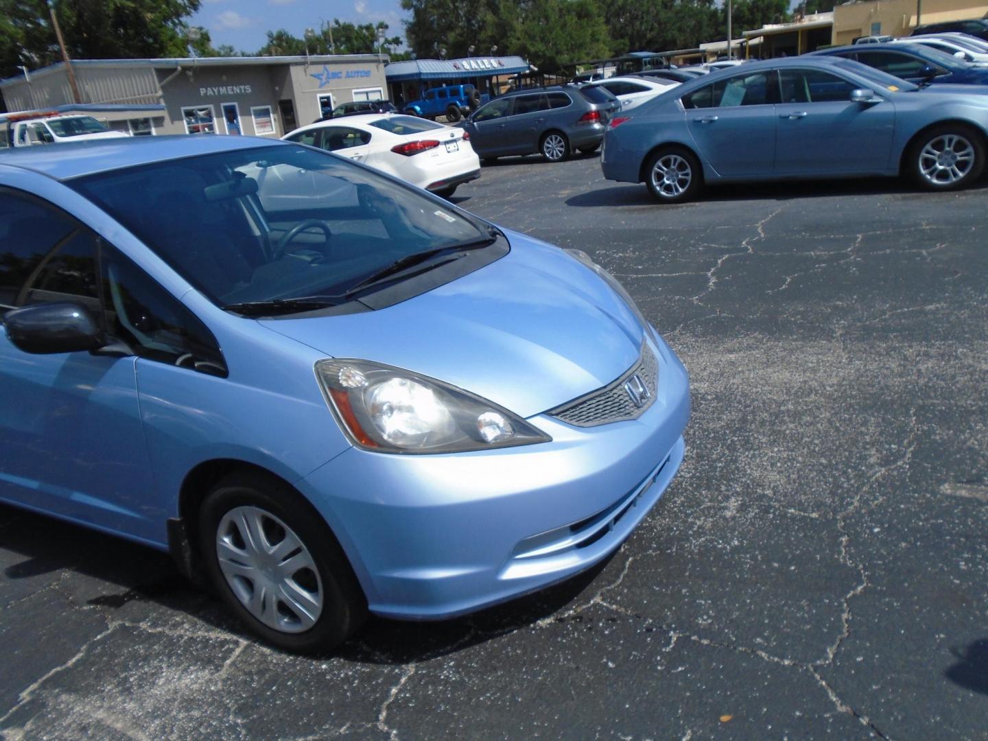 2009 Blue /GREY Honda Fit (JHMGE88289C) , located at 6112 N Florida Avenue, Tampa, FL, 33604, (888) 521-5131, 27.954929, -82.459534 - 499$ down plus tag & tax. - Photo#2