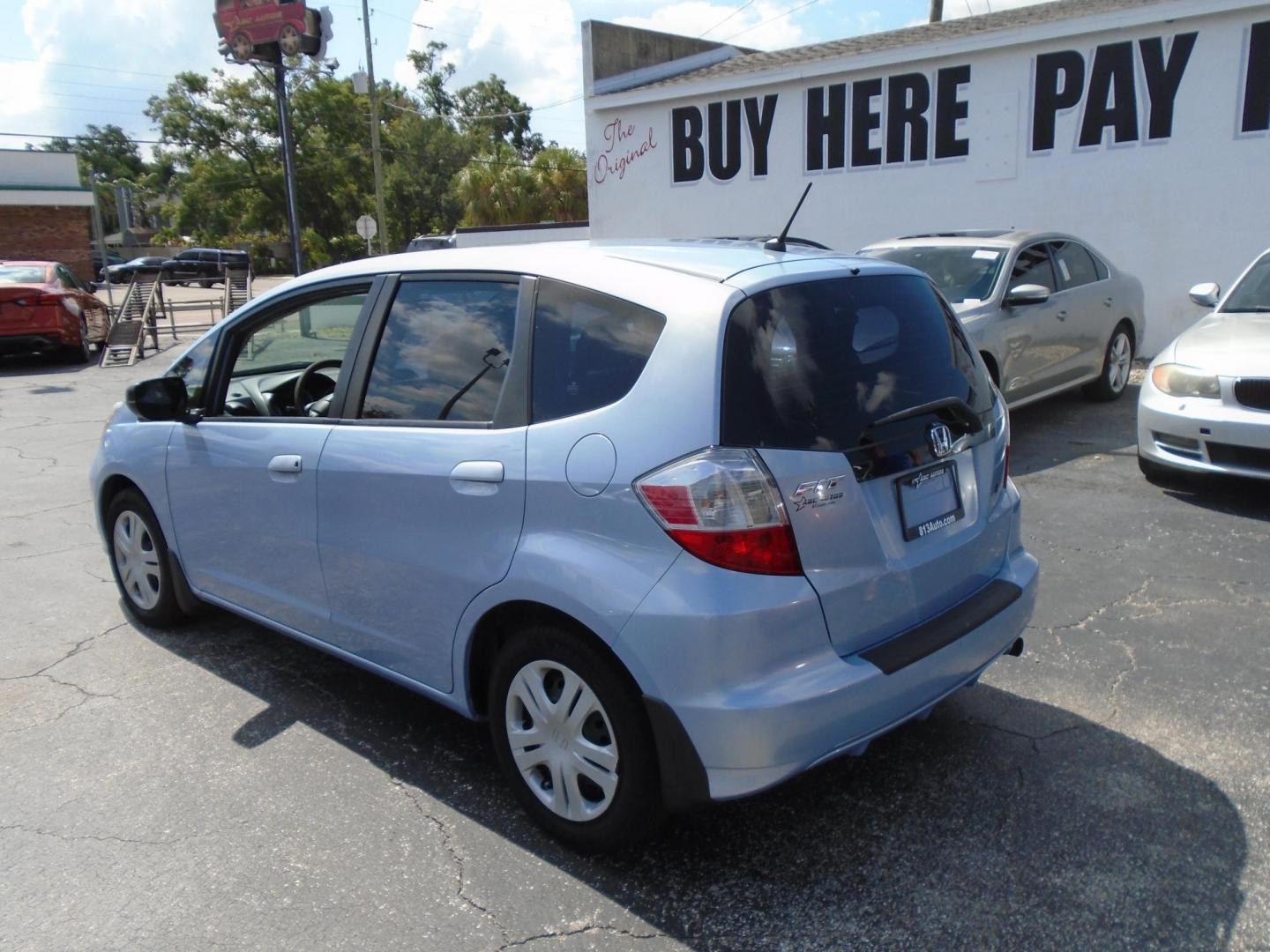 2009 Blue /GREY Honda Fit (JHMGE88289C) , located at 6112 N Florida Avenue, Tampa, FL, 33604, (888) 521-5131, 27.954929, -82.459534 - 499$ down plus tag & tax. - Photo#4