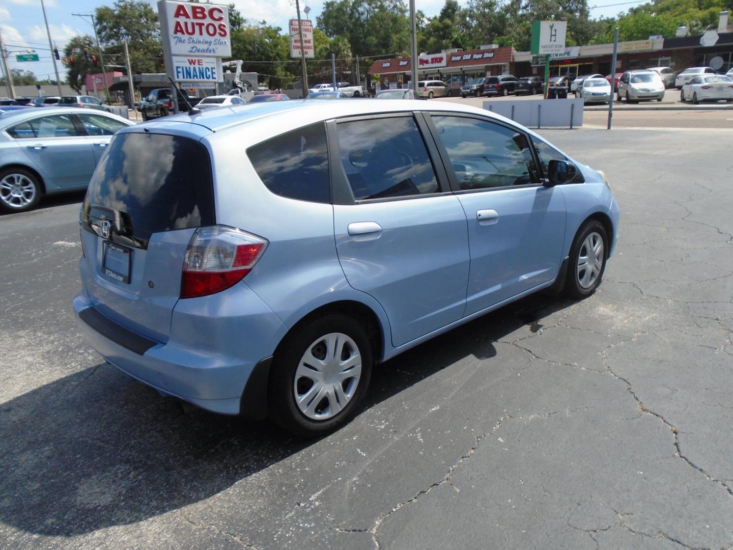 2009 Blue /GREY Honda Fit (JHMGE88289C) , located at 6112 N Florida Avenue, Tampa, FL, 33604, (888) 521-5131, 27.954929, -82.459534 - 499$ down plus tag & tax. - Photo#3