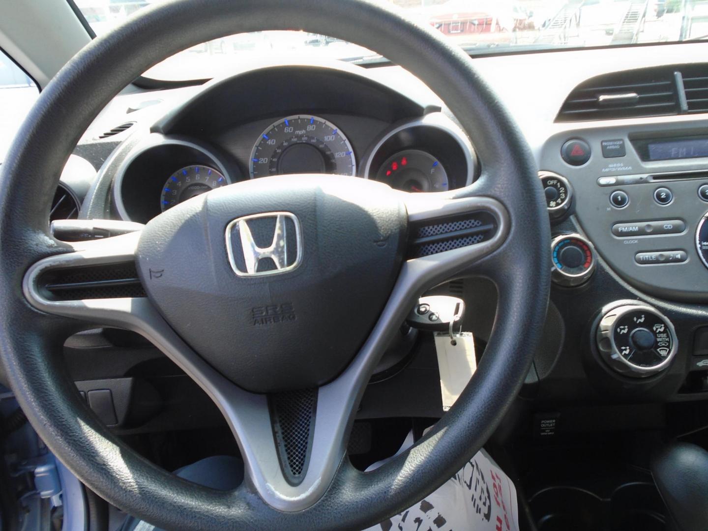 2009 Blue /GREY Honda Fit (JHMGE88289C) , located at 6112 N Florida Avenue, Tampa, FL, 33604, (888) 521-5131, 27.954929, -82.459534 - 499$ down plus tag & tax. - Photo#8