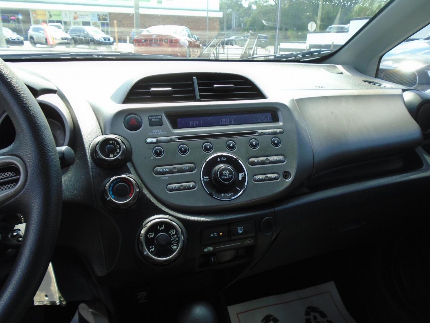 2009 Blue /GREY Honda Fit (JHMGE88289C) , located at 6112 N Florida Avenue, Tampa, FL, 33604, (888) 521-5131, 27.954929, -82.459534 - 499$ down plus tag & tax. - Photo#9