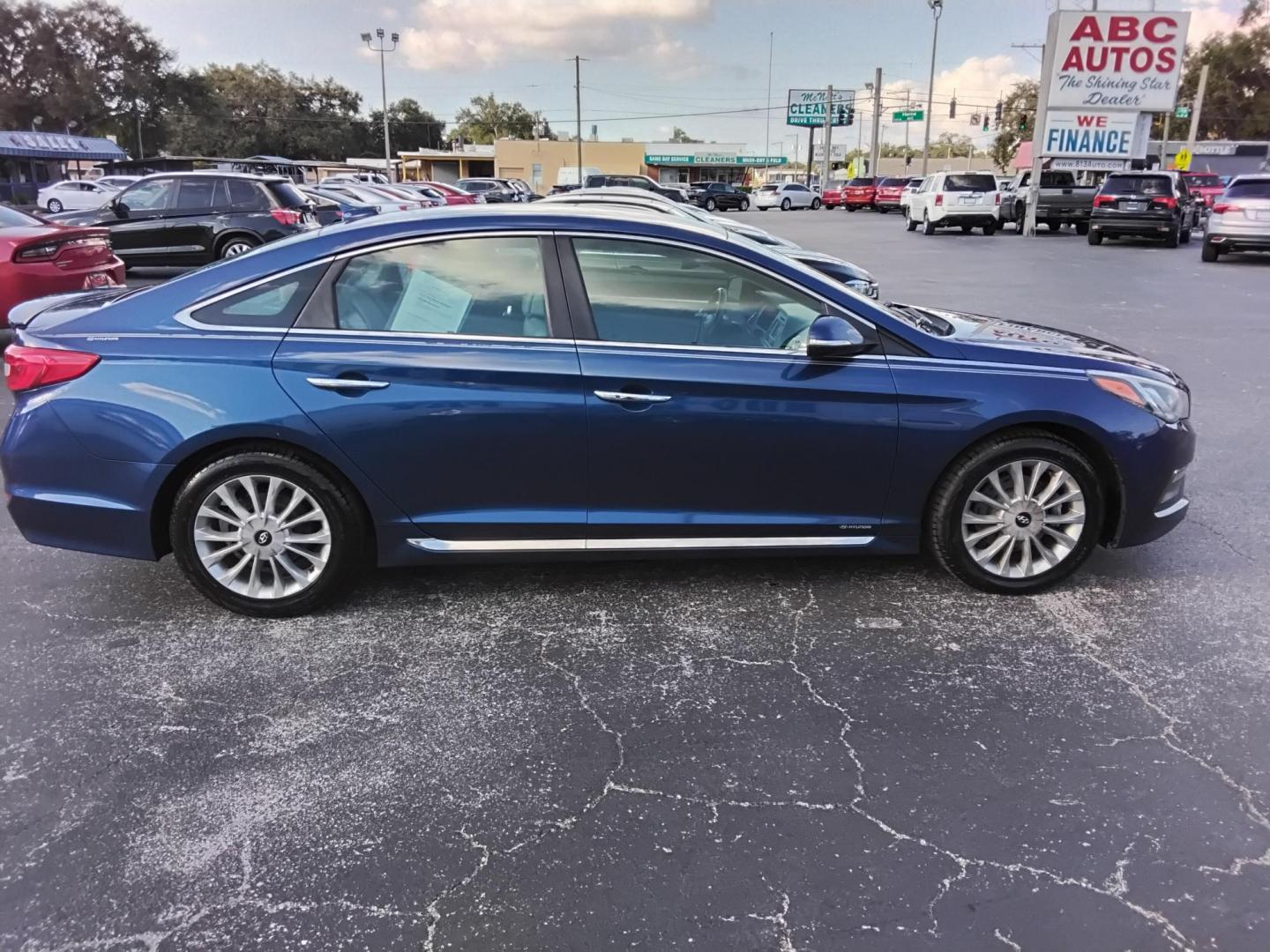 2015 Blue /Grey Hyundai Sonata (5NPE34AF6FH) , located at 6112 N Florida Avenue, Tampa, FL, 33604, (888) 521-5131, 27.954929, -82.459534 - 499$ DOWN PLUS TAX & TAG. - Photo#5