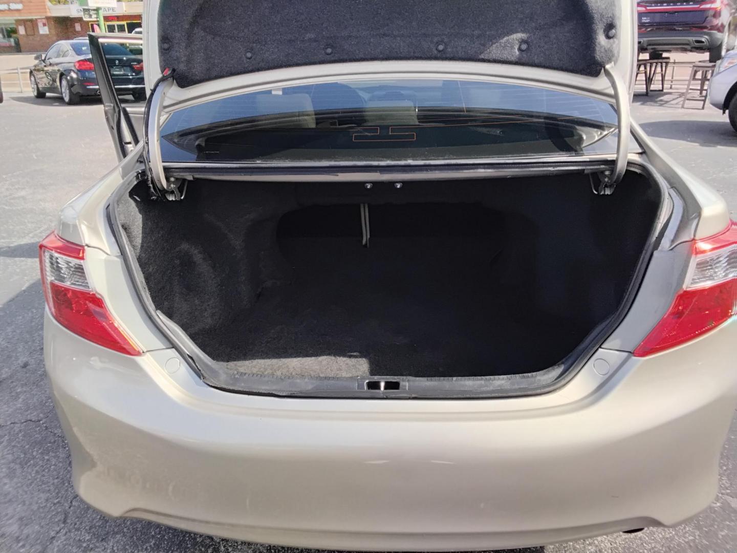 2013 GOLD /Beige Toyota Camry (4T1BF1FK2DU) , located at 6112 N Florida Avenue, Tampa, FL, 33604, (888) 521-5131, 27.954929, -82.459534 - $499 DOWN PLUS TAX & TAG.- Photo#7
