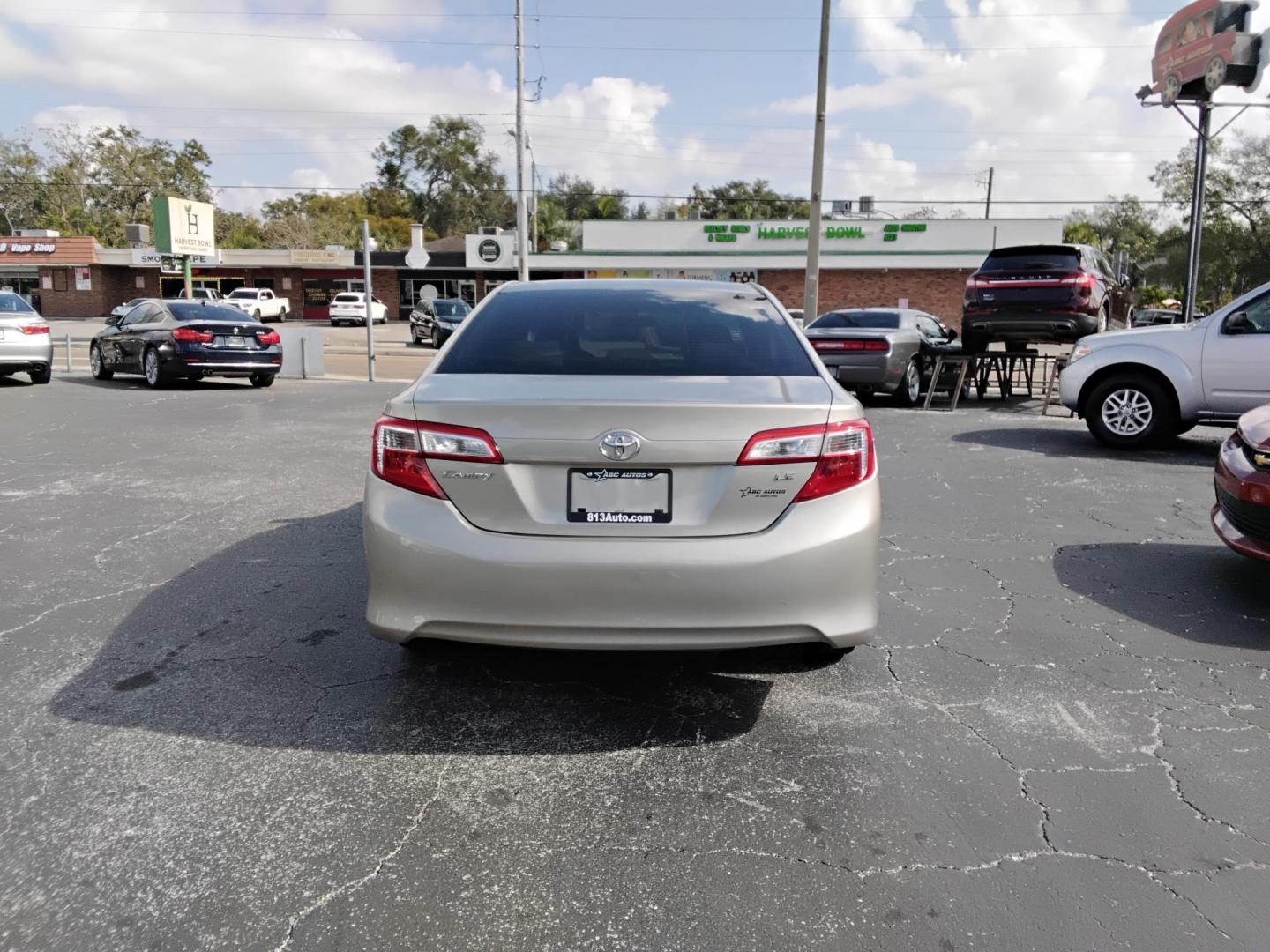2013 GOLD /Beige Toyota Camry (4T1BF1FK2DU) , located at 6112 N Florida Avenue, Tampa, FL, 33604, (888) 521-5131, 27.954929, -82.459534 - $499 DOWN PLUS TAX & TAG.- Photo#6