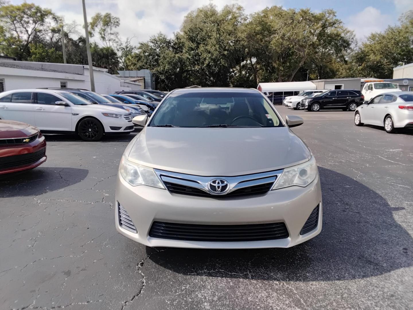 2013 GOLD /Beige Toyota Camry (4T1BF1FK2DU) , located at 6112 N Florida Avenue, Tampa, FL, 33604, (888) 521-5131, 27.954929, -82.459534 - $499 DOWN PLUS TAX & TAG.- Photo#2