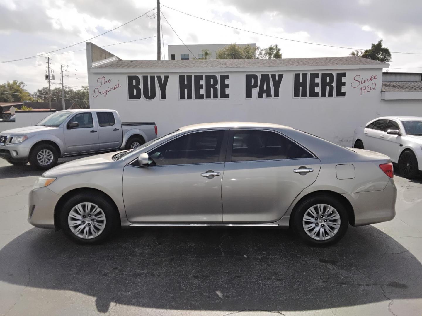 2013 GOLD /Beige Toyota Camry (4T1BF1FK2DU) , located at 6112 N Florida Avenue, Tampa, FL, 33604, (888) 521-5131, 27.954929, -82.459534 - $499 DOWN PLUS TAX & TAG.- Photo#0