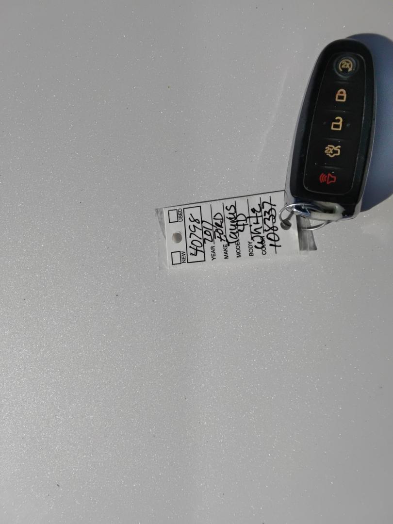 2017 White /Beige Ford Taurus (1FAHP2F83HG) , located at 6112 N Florida Avenue, Tampa, FL, 33604, (888) 521-5131, 27.954929, -82.459534 - $499 DOWN PLUS TAX & TAG. - Photo#14