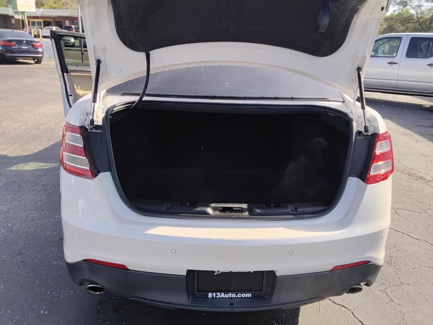 2017 White /Beige Ford Taurus (1FAHP2F83HG) , located at 6112 N Florida Avenue, Tampa, FL, 33604, (888) 521-5131, 27.954929, -82.459534 - $499 DOWN PLUS TAX & TAG. - Photo#7