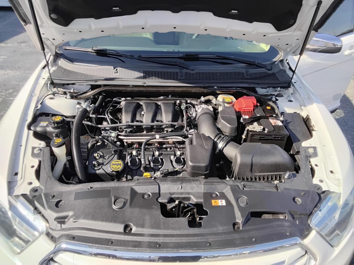 2017 White /Beige Ford Taurus (1FAHP2F83HG) , located at 6112 N Florida Avenue, Tampa, FL, 33604, (888) 521-5131, 27.954929, -82.459534 - $499 DOWN PLUS TAX & TAG. - Photo#13