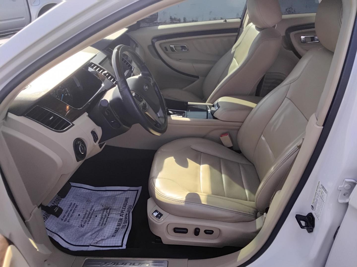 2017 White /Beige Ford Taurus (1FAHP2F83HG) , located at 6112 N Florida Avenue, Tampa, FL, 33604, (888) 521-5131, 27.954929, -82.459534 - $499 DOWN PLUS TAX & TAG. - Photo#10