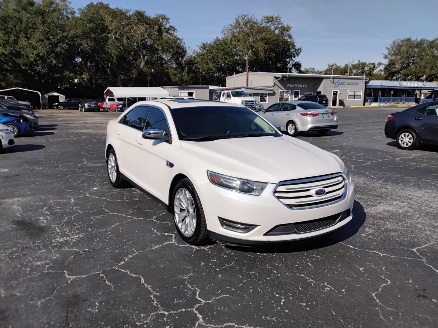 2017 White /Beige Ford Taurus (1FAHP2F83HG) , located at 6112 N Florida Avenue, Tampa, FL, 33604, (888) 521-5131, 27.954929, -82.459534 - $499 DOWN PLUS TAX & TAG. - Photo#3