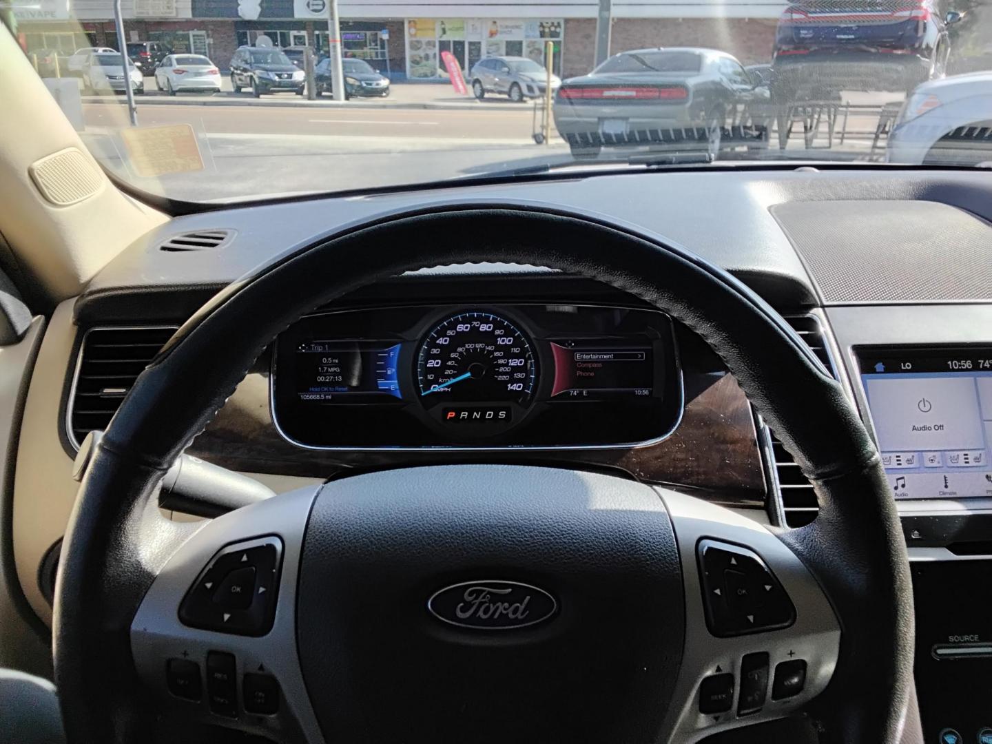 2017 White /Beige Ford Taurus (1FAHP2F83HG) , located at 6112 N Florida Avenue, Tampa, FL, 33604, (888) 521-5131, 27.954929, -82.459534 - $499 DOWN PLUS TAX & TAG. - Photo#9