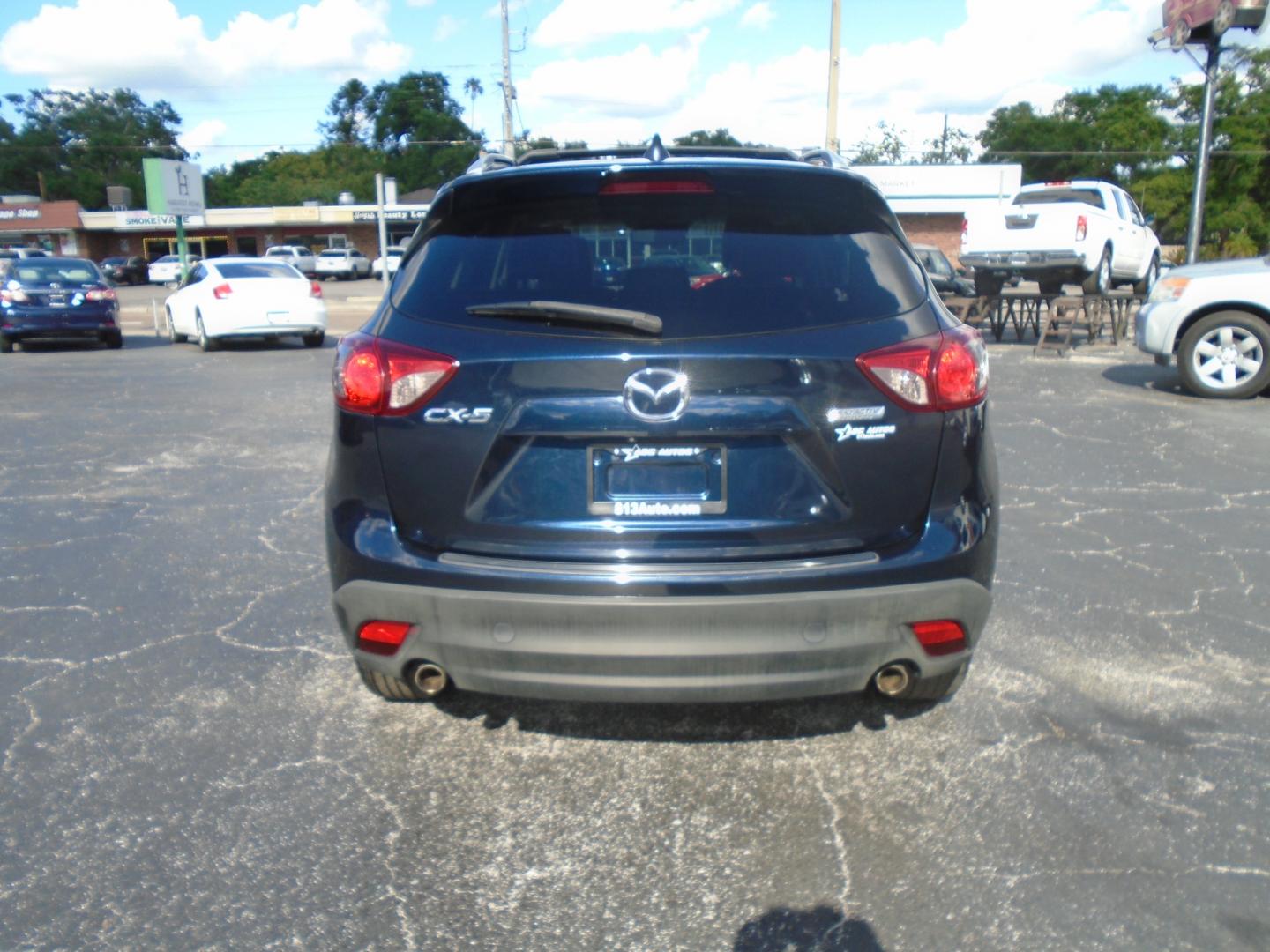 2014 Mazda CX-5 (JM3KE2DY8E0) , located at 6112 N Florida Avenue, Tampa, FL, 33604, (888) 521-5131, 27.954929, -82.459534 - Photo#3