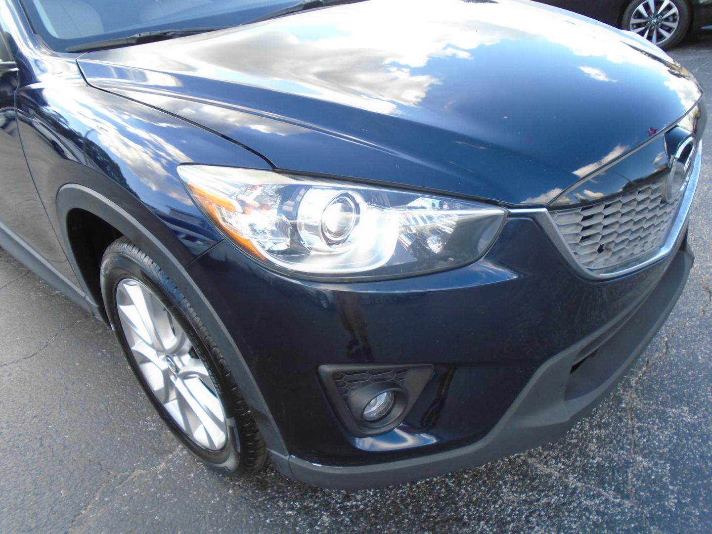 2014 Mazda CX-5 (JM3KE2DY8E0) , located at 6112 N Florida Avenue, Tampa, FL, 33604, (888) 521-5131, 27.954929, -82.459534 - Photo#14