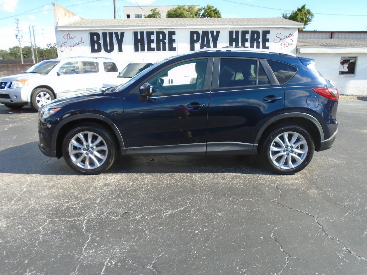 2014 Mazda CX-5 (JM3KE2DY8E0) , located at 6112 N Florida Avenue, Tampa, FL, 33604, (888) 521-5131, 27.954929, -82.459534 - Photo#0