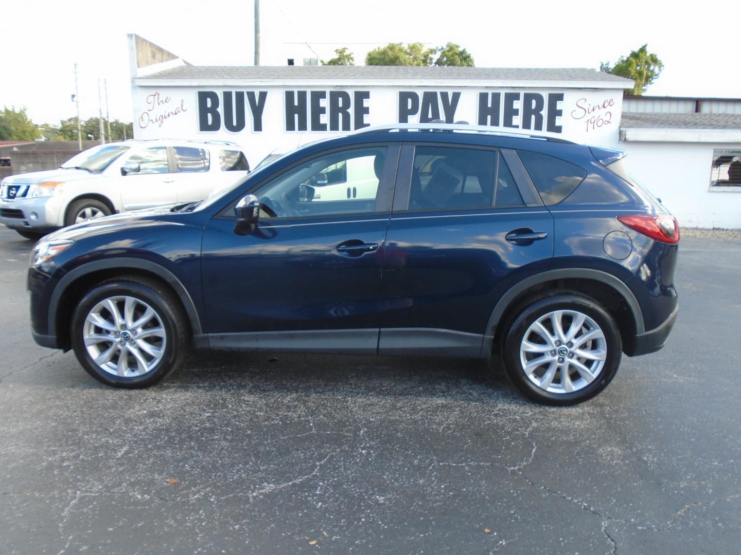 2014 Mazda CX-5 (JM3KE2DY8E0) , located at 6112 N Florida Avenue, Tampa, FL, 33604, (888) 521-5131, 27.954929, -82.459534 - Photo#4