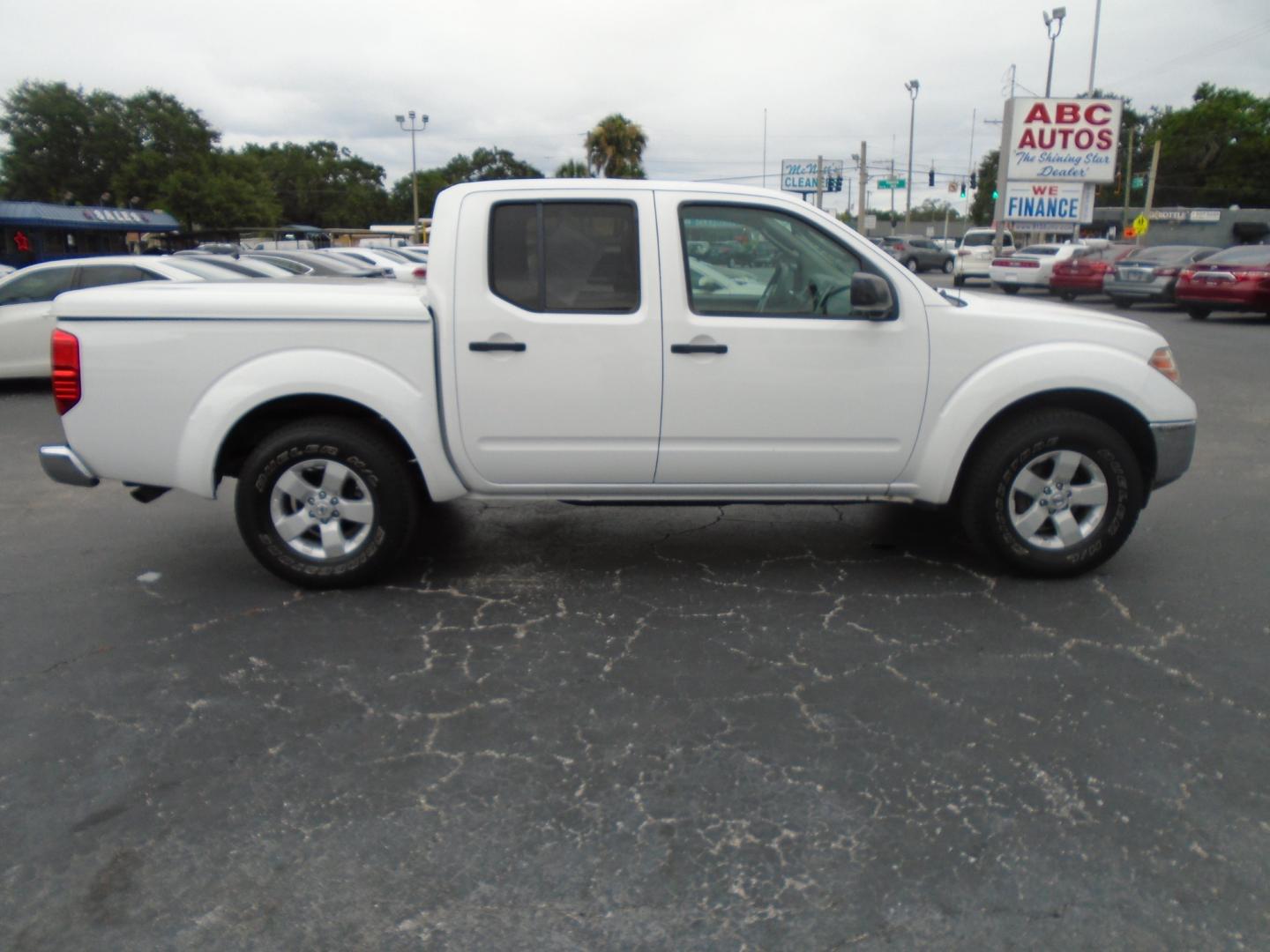 2011 Nissan Frontier (1N6AD0ER2BC) , located at 6112 N Florida Avenue, Tampa, FL, 33604, (888) 521-5131, 27.954929, -82.459534 - Photo#2