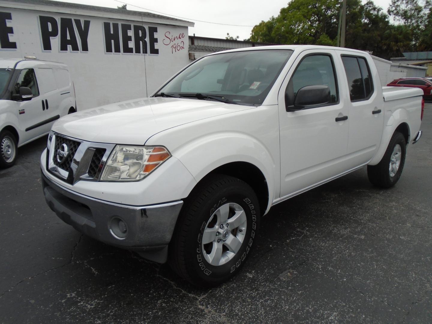 2011 Nissan Frontier (1N6AD0ER2BC) , located at 6112 N Florida Avenue, Tampa, FL, 33604, (888) 521-5131, 27.954929, -82.459534 - Photo#4