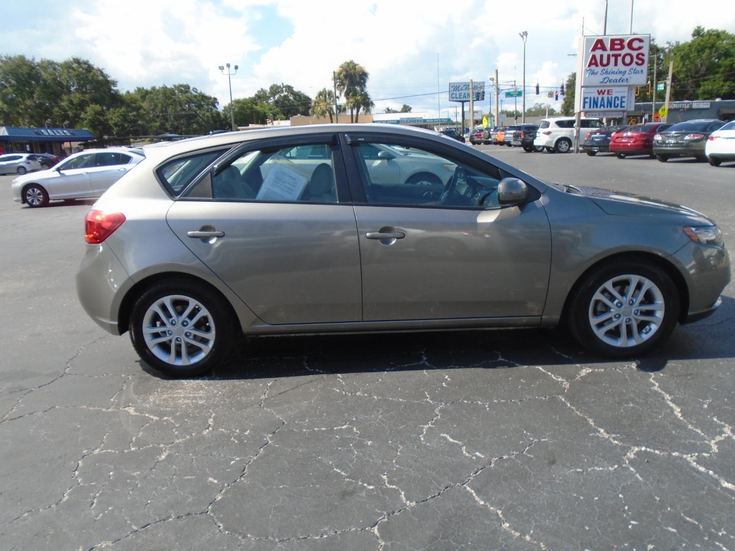 2012 Kia Forte 5-Door (KNAFU5A23C5) , located at 6112 N Florida Avenue, Tampa, FL, 33604, (888) 521-5131, 27.954929, -82.459534 - Photo#2