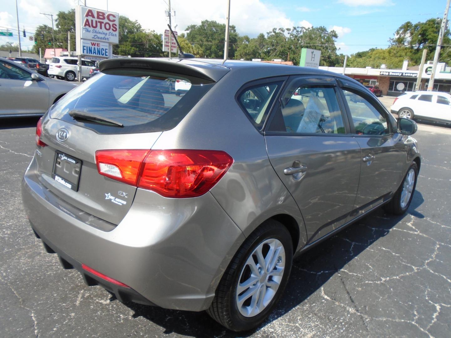 2012 Kia Forte 5-Door (KNAFU5A23C5) , located at 6112 N Florida Avenue, Tampa, FL, 33604, (888) 521-5131, 27.954929, -82.459534 - Photo#6