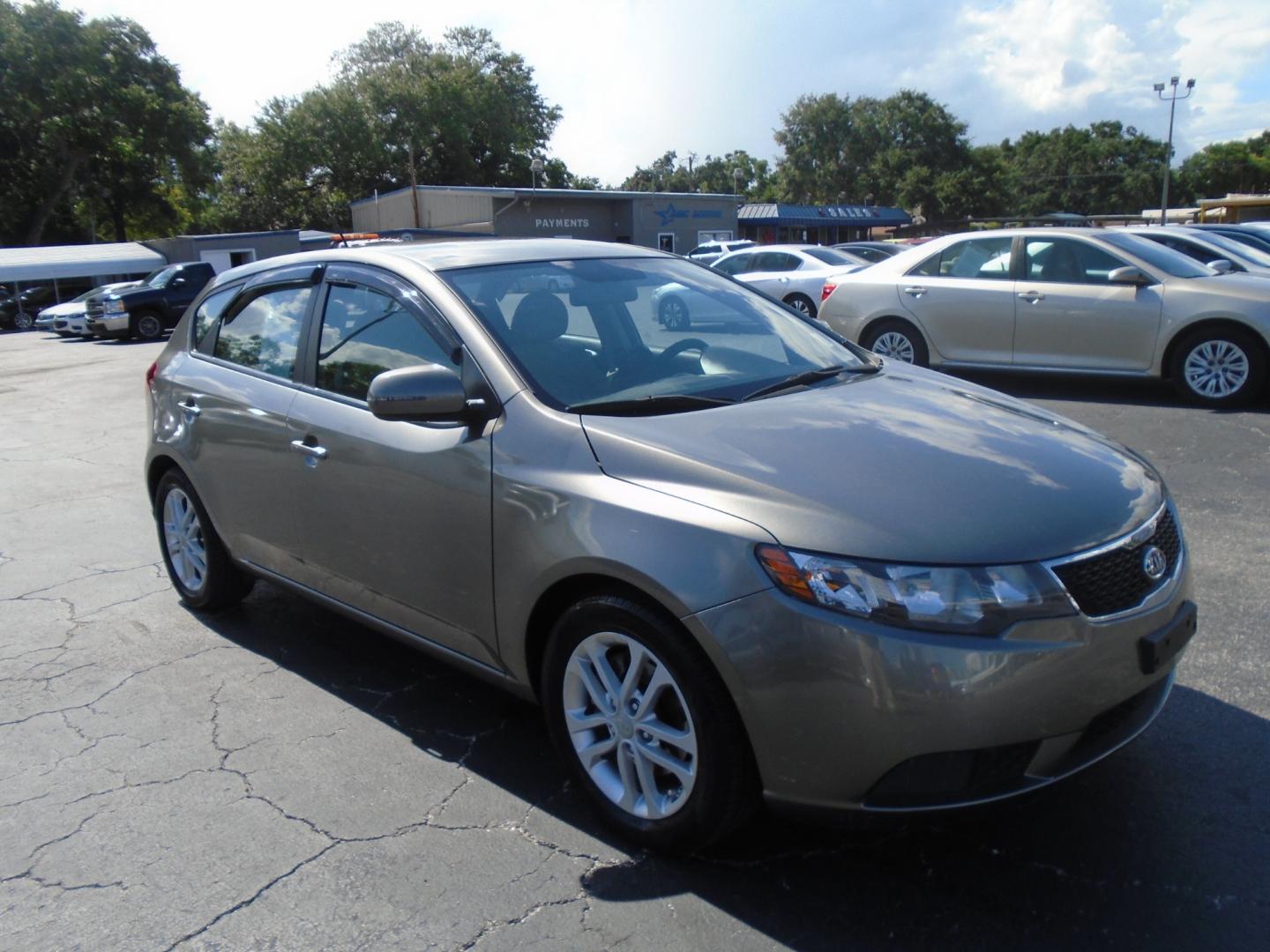 2012 Kia Forte 5-Door (KNAFU5A23C5) , located at 6112 N Florida Avenue, Tampa, FL, 33604, (888) 521-5131, 27.954929, -82.459534 - Photo#5