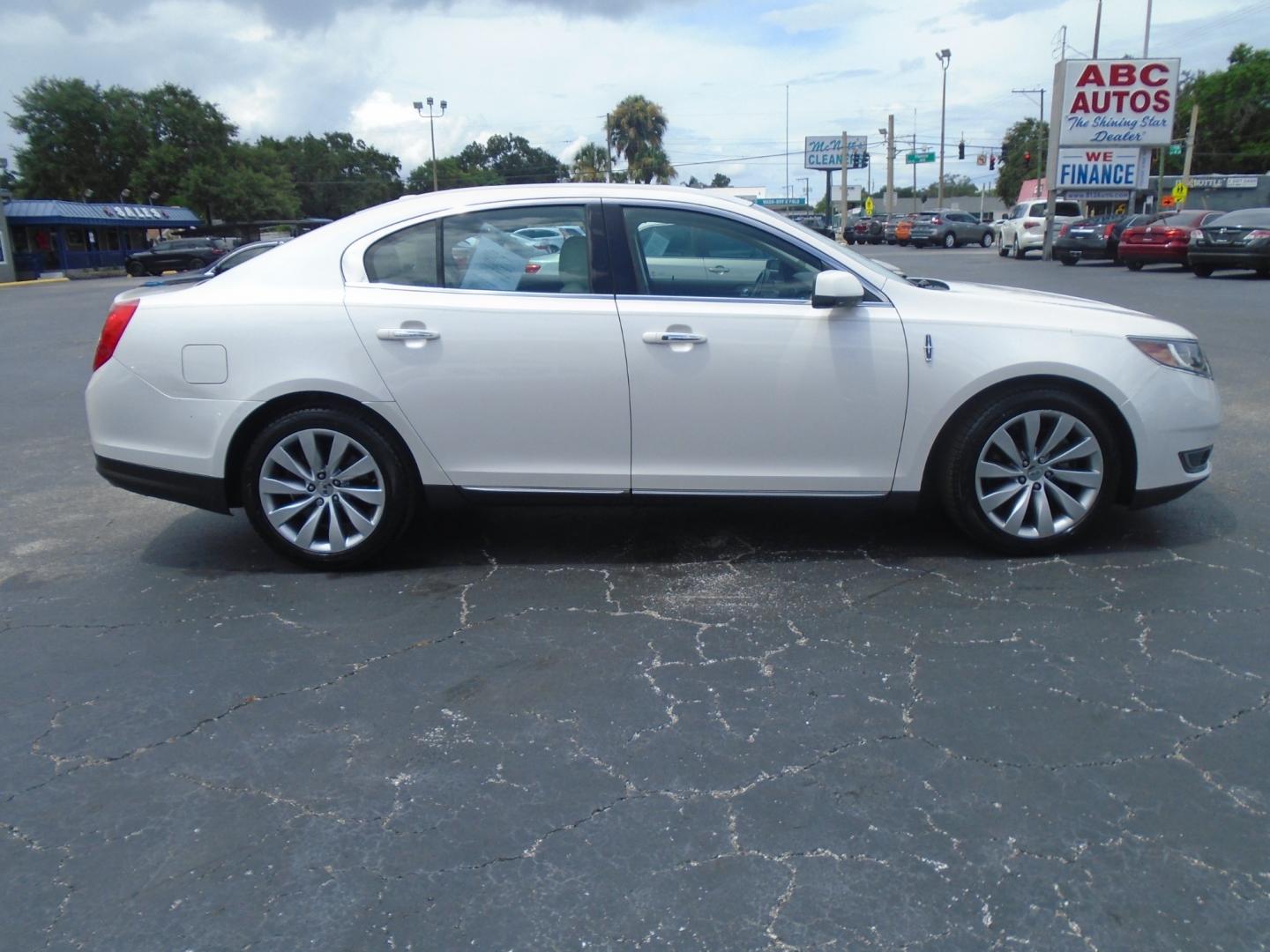 2015 Lincoln MKS (1LNHL9DK5FG) , located at 6112 N Florida Avenue, Tampa, FL, 33604, (888) 521-5131, 27.954929, -82.459534 - Photo#2