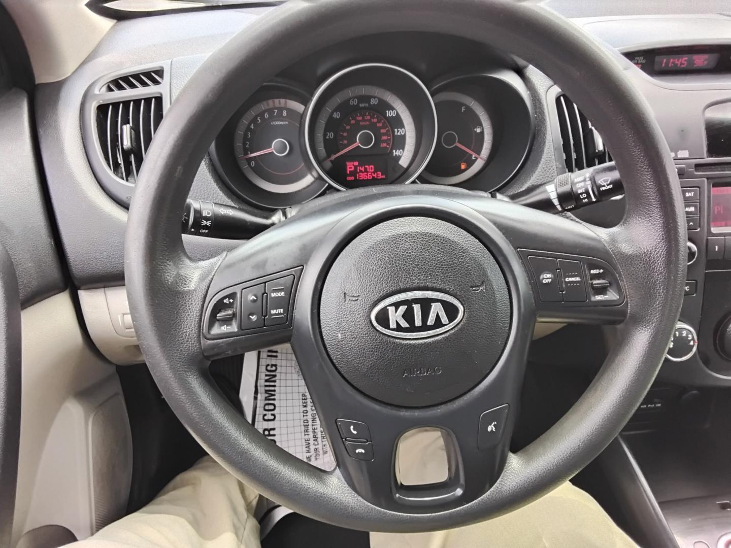 2012 White /Beige Kia Forte (KNAFU4A2XC5) , located at 6112 N Florida Avenue, Tampa, FL, 33604, (888) 521-5131, 27.954929, -82.459534 - $499 down plus tax & tag.- Photo#12