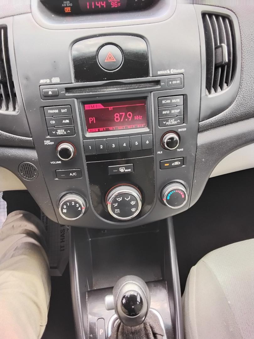 2012 White /Beige Kia Forte (KNAFU4A2XC5) , located at 6112 N Florida Avenue, Tampa, FL, 33604, (888) 521-5131, 27.954929, -82.459534 - $499 down plus tax & tag.- Photo#15