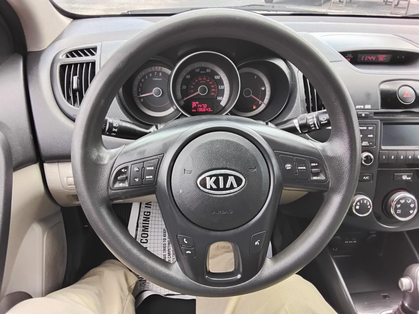 2012 White /Beige Kia Forte (KNAFU4A2XC5) , located at 6112 N Florida Avenue, Tampa, FL, 33604, (888) 521-5131, 27.954929, -82.459534 - $499 down plus tax & tag.- Photo#11