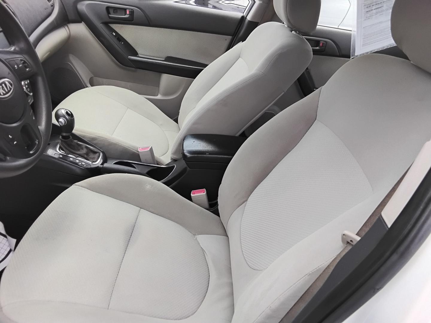 2012 White /Beige Kia Forte (KNAFU4A2XC5) , located at 6112 N Florida Avenue, Tampa, FL, 33604, (888) 521-5131, 27.954929, -82.459534 - $499 down plus tax & tag.- Photo#17