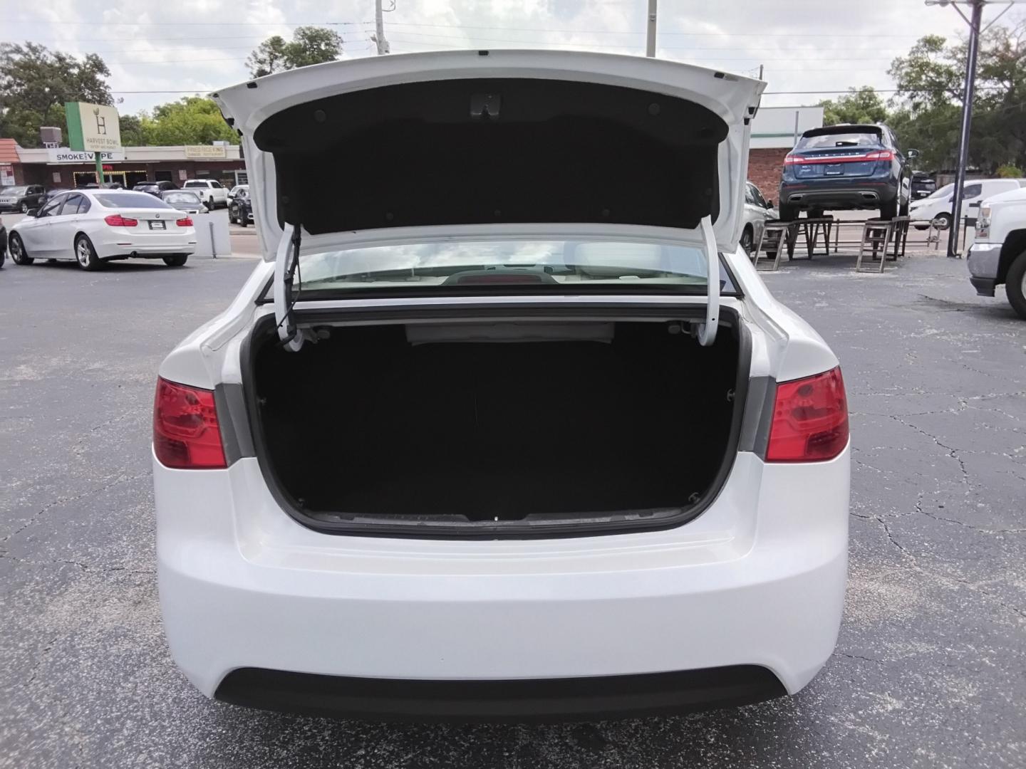 2012 White /Beige Kia Forte (KNAFU4A2XC5) , located at 6112 N Florida Avenue, Tampa, FL, 33604, (888) 521-5131, 27.954929, -82.459534 - $499 down plus tax & tag.- Photo#10