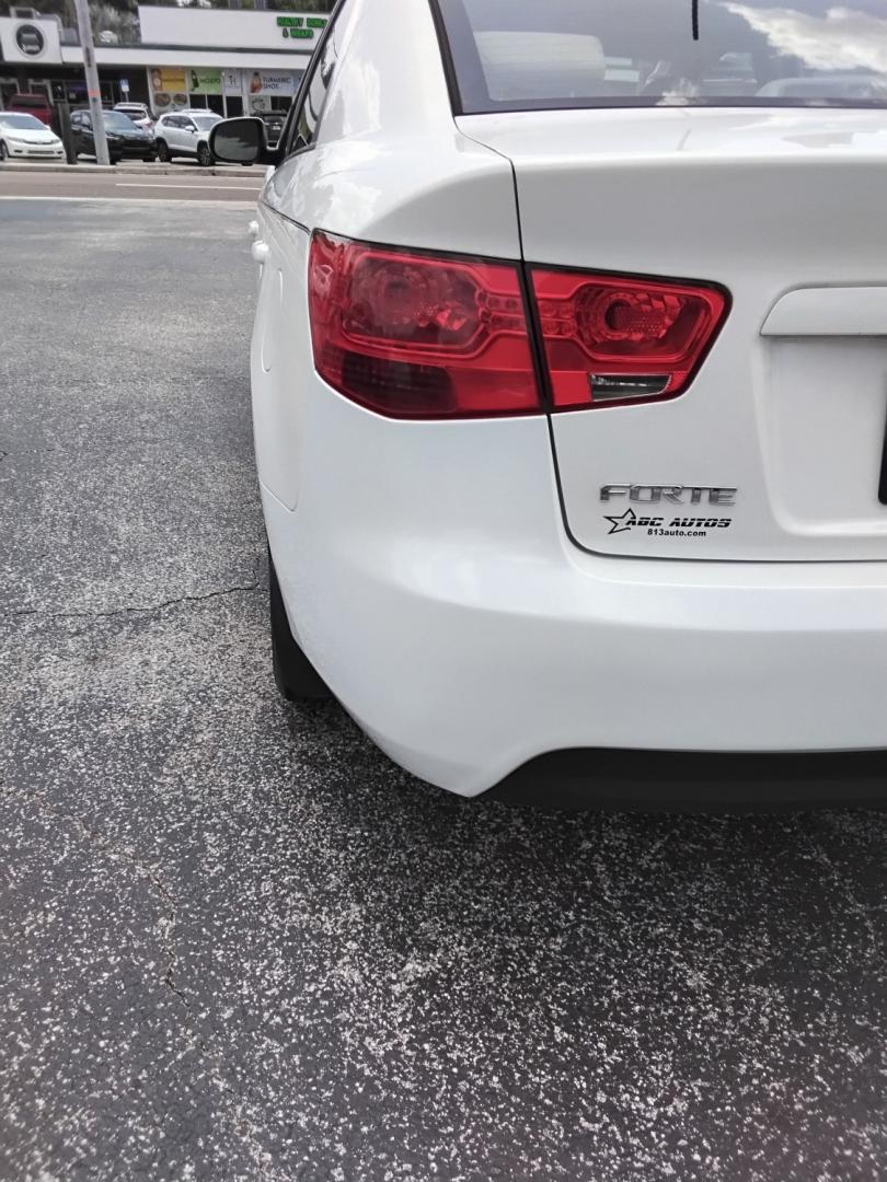 2012 White /Beige Kia Forte (KNAFU4A2XC5) , located at 6112 N Florida Avenue, Tampa, FL, 33604, (888) 521-5131, 27.954929, -82.459534 - $499 down plus tax & tag.- Photo#9